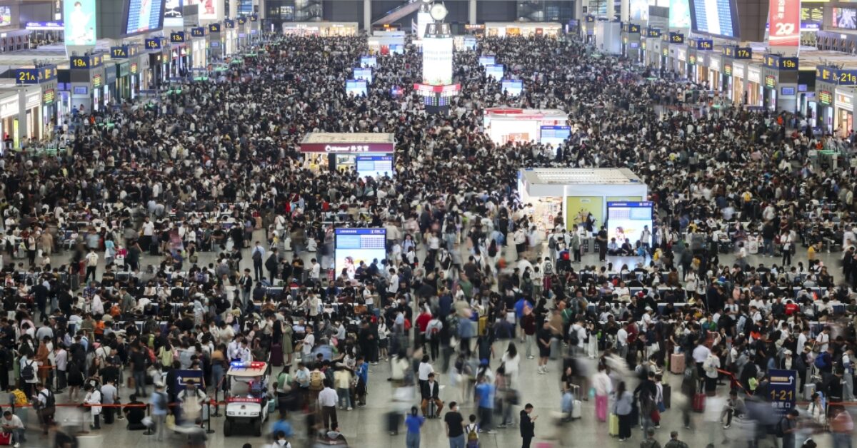 Passengers wait for trains at Shanghai Hongqiao Railway Station on May 1